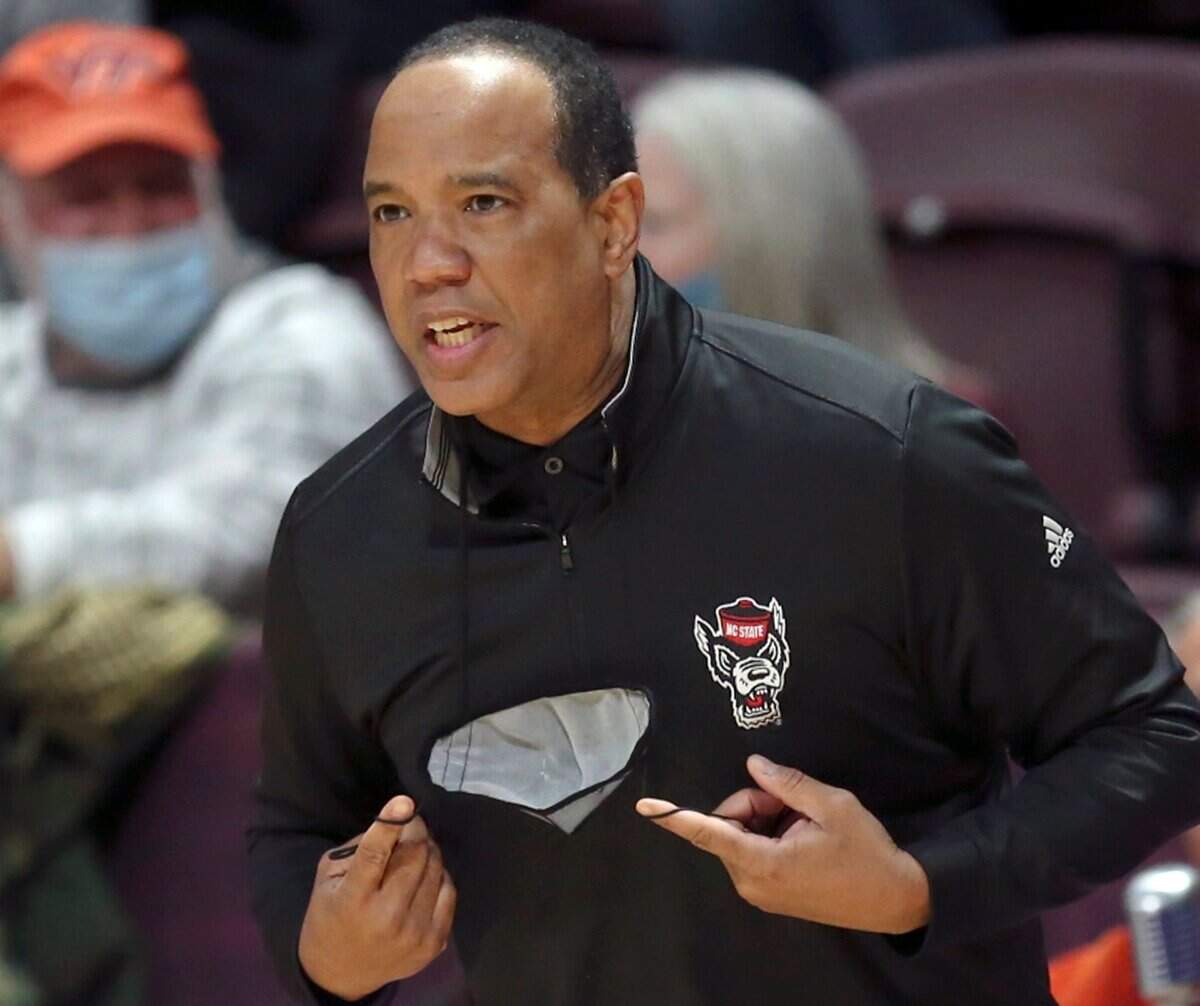 North Carolina State coach Kevin Keatts watches during the first half of the NCAA college basketball game against Virginia Tech on Tuesday, Jan. 4, 2022, in Blacksburg, Va. (Matt Gentry/The Roanoke Times via AP)
