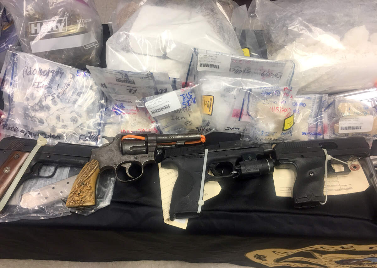 Federal prosecutors show off drugs and drugs seized during a press conference in Sampson County Friday, June 28, 2019. Prosecutors announced Friday life sentences for Antonio McKoy and others involved in a drug conspiracy centered in Sampson County that drew cocaine and heroin from cartel sources abroad and distributed across North Carolina.