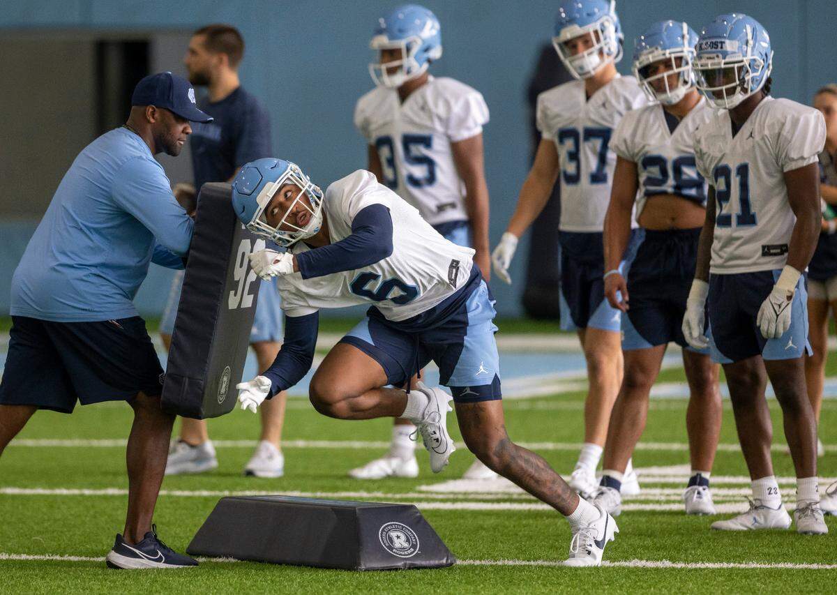 North Carolina defensive back Lejond Cavazos (6) runs through a drill during the Tar Heels’ first practice of the season on Wednesday, August 2, 2023 in Chapel Hill, N.C.