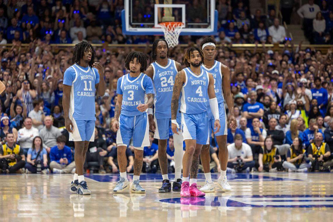 North Carolina players Ian Jackson (11), Elliot Cadeau (3), Jae’Lyn Withers (24), R.J. Davis (4) and Ven-Allen Lubin (22) watch Duke’s Tyrese Proctor (5) shoot technical free throws after a flagrant foul by Cadeau in the first half on Saturday, February 1, 2025 at Cameron Indoor Stadium in Durham, N.C. The Tar Heels fell 87-70 to the Blue Devils.