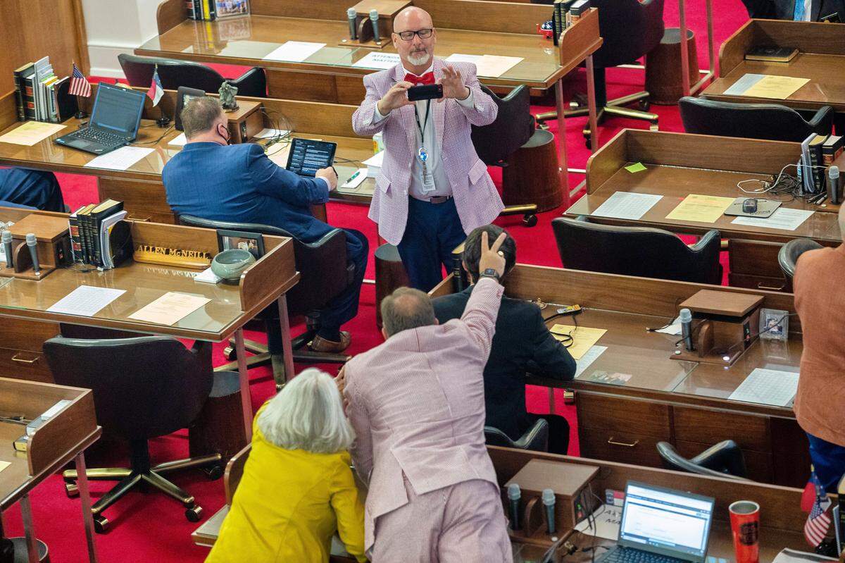 House Republicans pose for a photograph after voting to pass its $1.7 billion COVID-19 response bill, called the Pandemic Response Act, on Thursday, April 30, 2020 at the General Assembly.