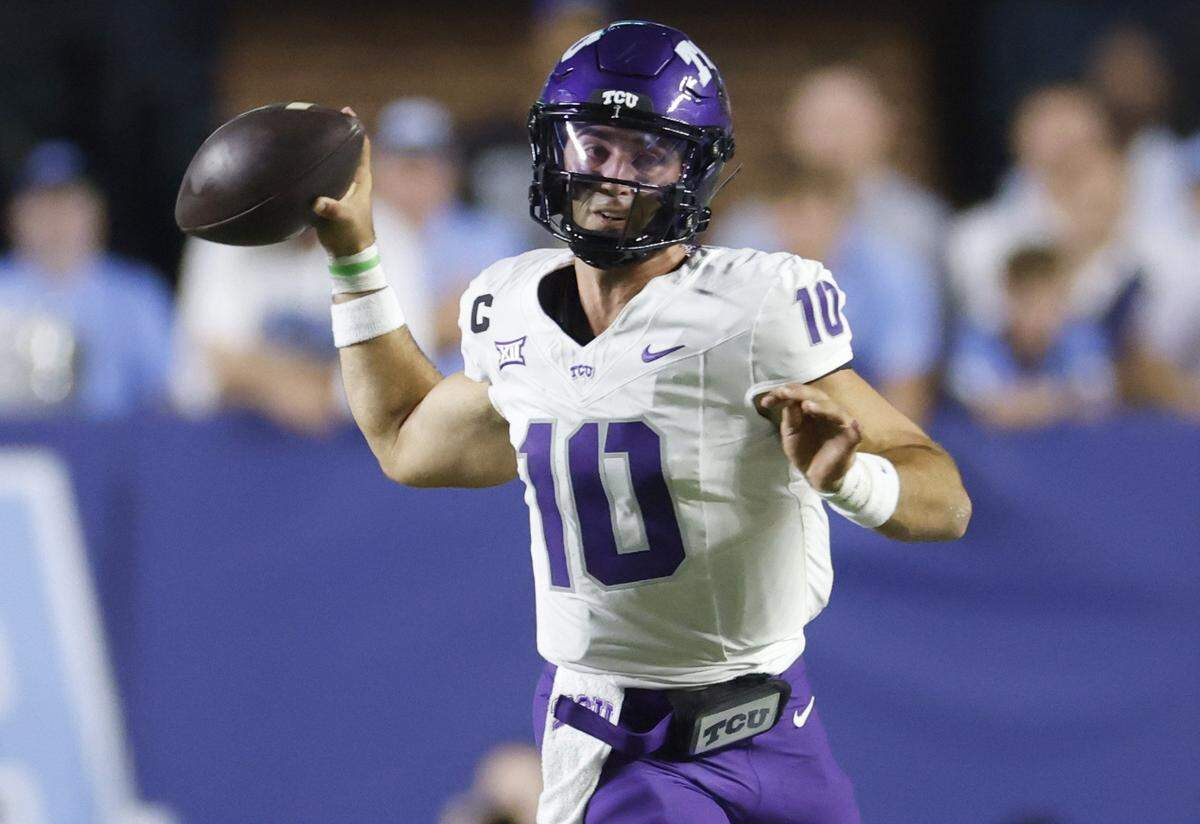 TCU quarterback Josh Hoover (10) looks for a receiver downfield during the first half of UNC’s game against TCU at Kenan Stadium in Chapel Hill, N.C., Monday, Sept. 1, 2025.