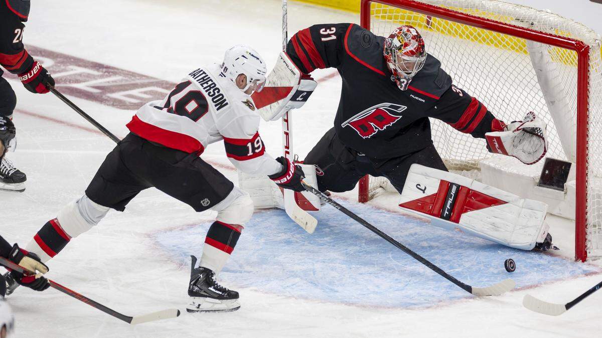 Carolina Hurricanes goalie Frederik Andersen (31) stops a scoring attempt by Ottawa right wing Drake Batherson (19) in the third period on Saturday, April 18, 2026 during the first round of the Stanley Cup Playoffs at Lenovo Center in Raleigh, N.C.