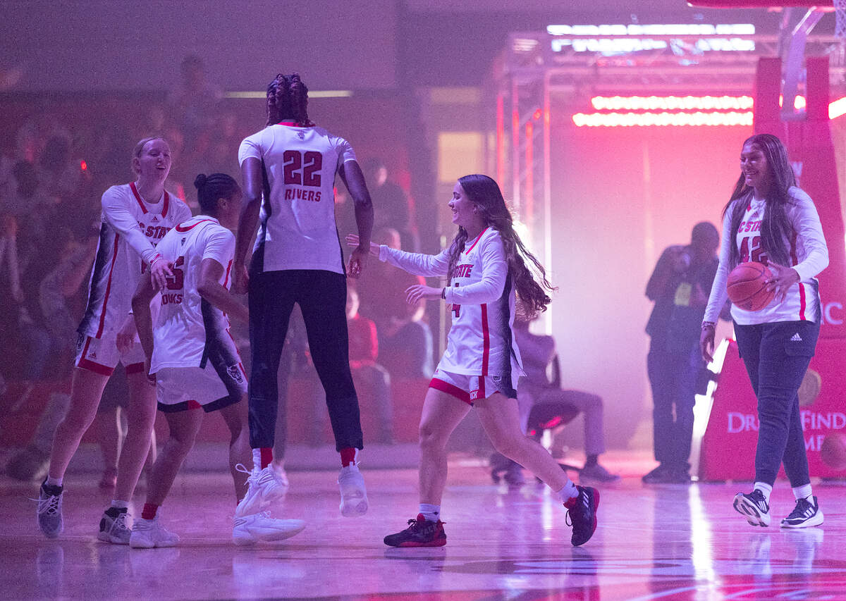 N.C. State women’s basketball players react during a skills contest at the “Primetime with the Pack” preseason event on Thursday, Oct. 26, 2023, at Reynolds Coliseum in Raleigh, N.C.