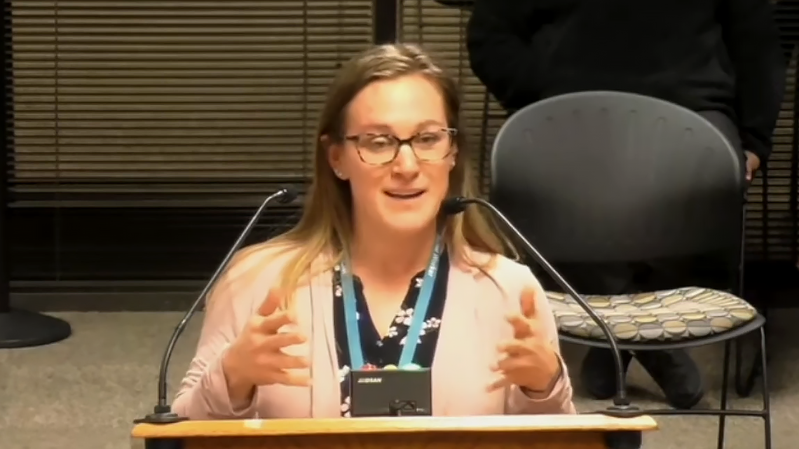 School social worker Megan Pohl tells the Wake County school board on Jan. 17, 2023 that she and her colleagues should be paid extra for having master’s degrees.