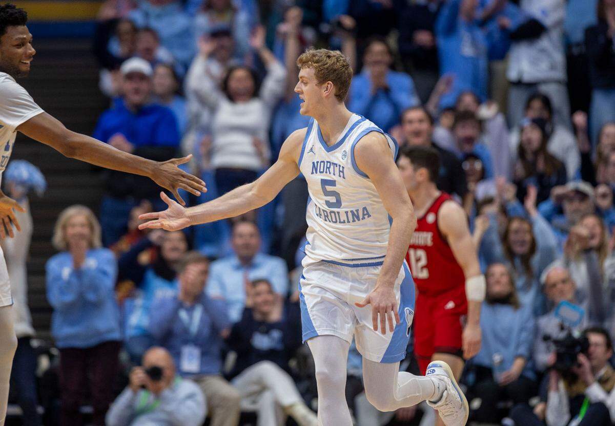 North Carolina forward Cade Tyson (5) reacts after sinking a three-point basket in the first half against N.C. State on Wednesday, February 19, 2025 in Chapel Hill, N.C.