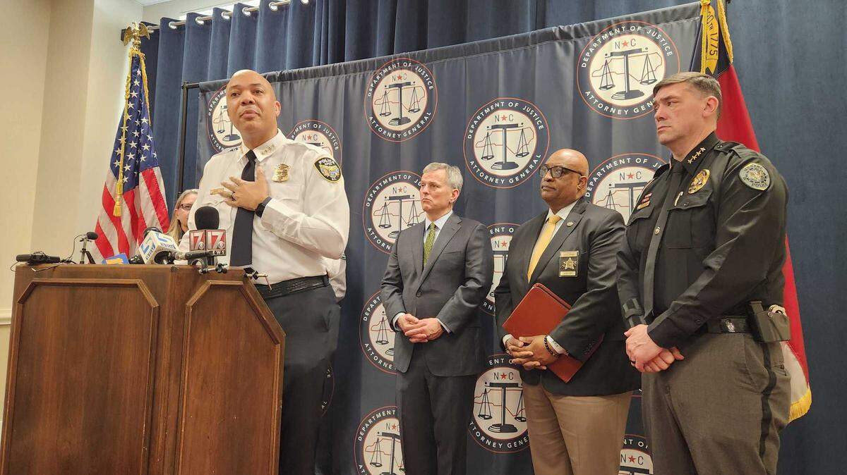 Apex Police Chief Jason Armstrong talks about the need to recruit and retain more law enforcement officers in North Carolina during a press conference at the N.C. Department of Justice on Wednesday, May 22, 2024.