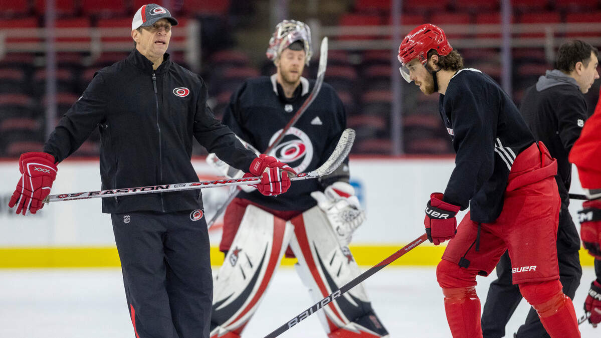 Carolina Hurricanes coach Rod Brind’Amour skates with Dylan Coghlan (15) and goalie Antii Raanta (32) during the Hurricanes’ practice on Monday, May 15, 2023 at PNC Arena in Raleigh, N.C.