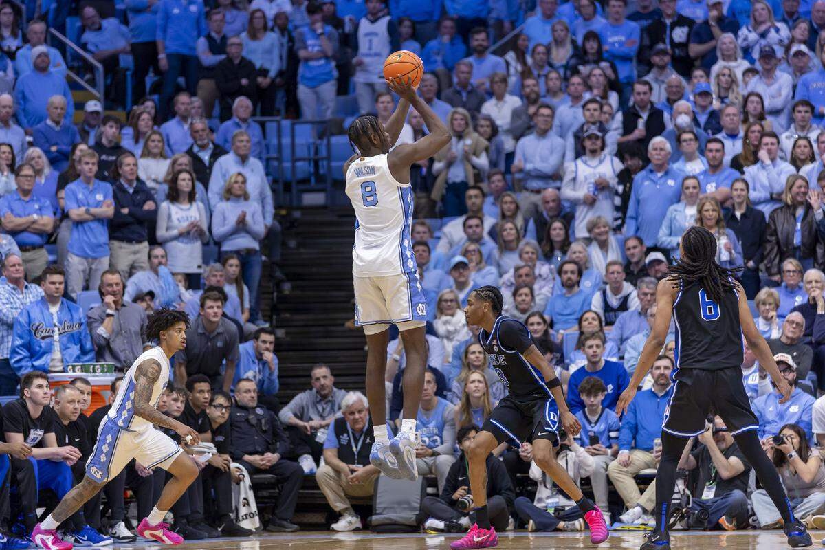 North Carolina forward Caleb Wilson (8) launches a three-point attempt in the first half against Duke on Saturday, February 7, 2026 at the Smith Center in Chapel Hill, N.C.