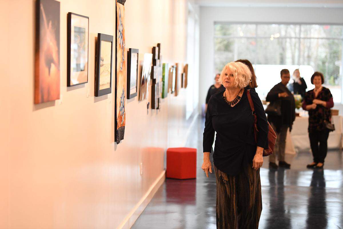 The Fuquay-Varina Arts Center was transformed and expanded to create a 19,700-square-foot modern venue. The first floor contains an open gallery to showcase local artists.