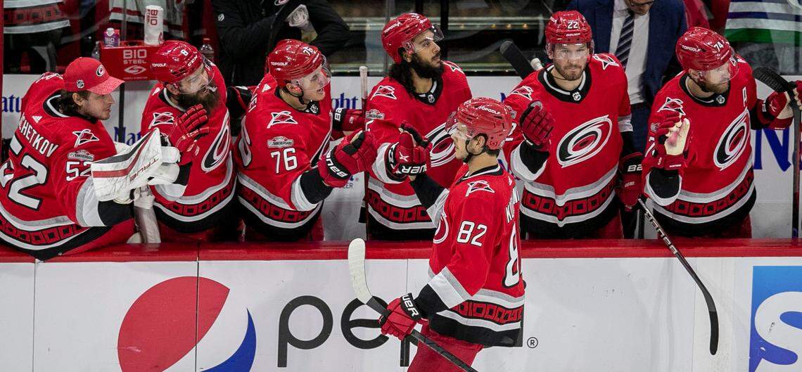 The Carolina Hurricanes Jesperi Kotkaniemi (82) skates to the bench after scoring on New Jersey Devils goalie Akira Schmid (40) in the second period during Game 2 of their second round Stanley Cup playoff series on Friday, May 5, 2023 at PNC Arena in Raleigh, N.C.