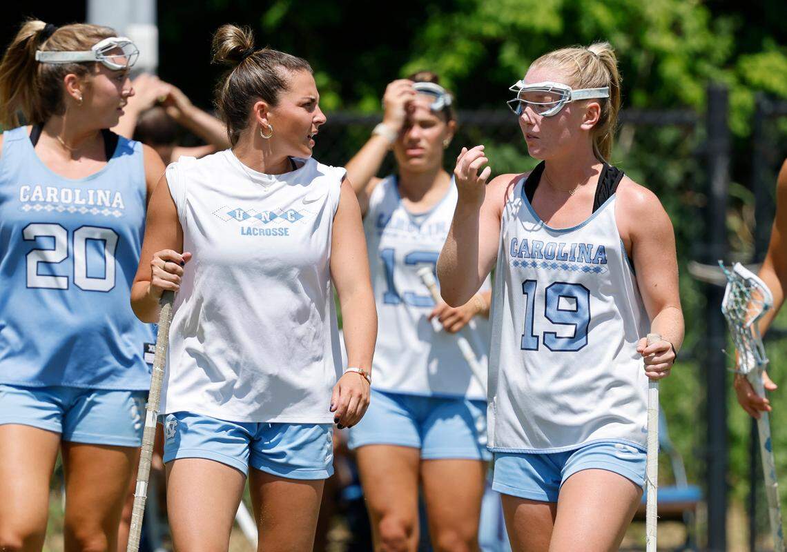 North Carolina’s Nicole Humphrey, left, talks to Julia O’Connor (19) during practice Friday, May 2, 2025.