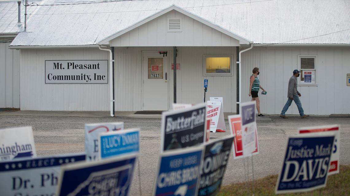 Voters arrive to cast their ballots at the Mt. Pleasant Community Center near Bailey, N.C. on Thursday, October 22, 2020.