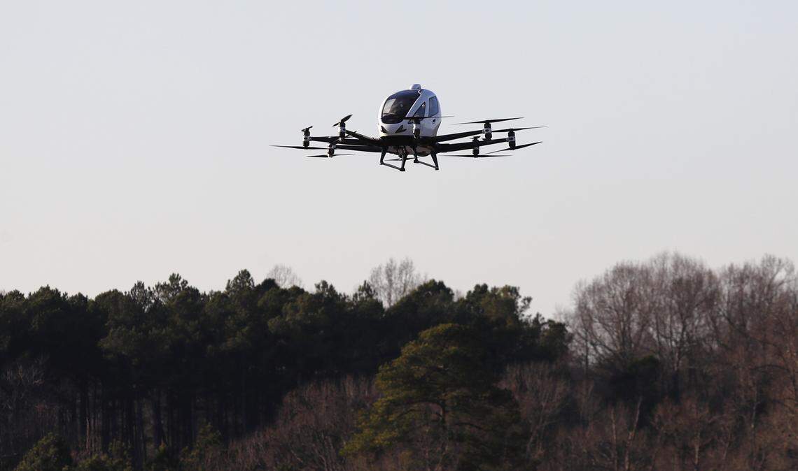 The EH 216, a two-seat drone, flies during what was billed as North America’s first public demonstration flight of a pilot-less air taxi. The drone is made by the Chinese company EHang and was demonstrated at State Highway Patrol’s test track in Raleigh, N.C., Tuesday, Jan. 7, 2020.