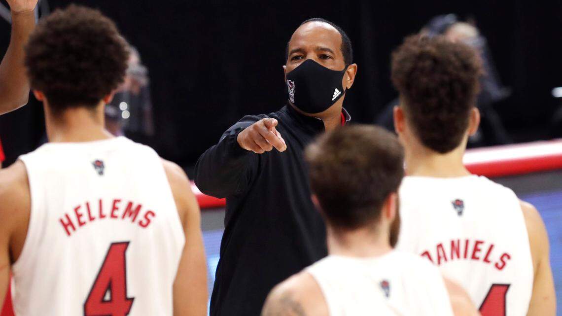 N.C. State’s head coach Kevin Keatts talks with his players during the second half of N.C. State’s 95-61 victory over Charleston Southern in the Wolfpack Invitational at Reynolds Coliseum in Raleigh, N.C., Wednesday, Nov. 25, 2020.