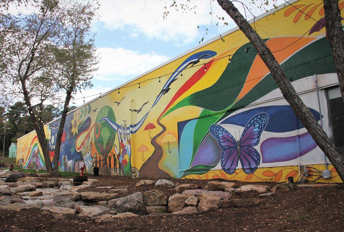 A new 150-foot mural in Durham’s Lakewood Shopping Center celebrates North Carolina’s diversity. Led led by artists Cornelio Campos and Estephani Sanchez, the project includes a recycling stream and small garden and has transformed a once vacant space between buildings. “Before this, this was nothing ... a trash can, beer bottles and needles,” says Luke Smith, director of El Futuro, a mental health clinic that collaborated on the project with The Scrap Exchange, a creative reuse center.