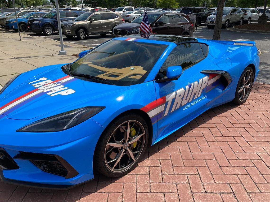 A GI Joe-themed Chevrolet Corvette painted with the words “Trump: A real American hero” is parked outside the NC GOP’s annual convention in Greenville on Saturday, June 5, 2021.
