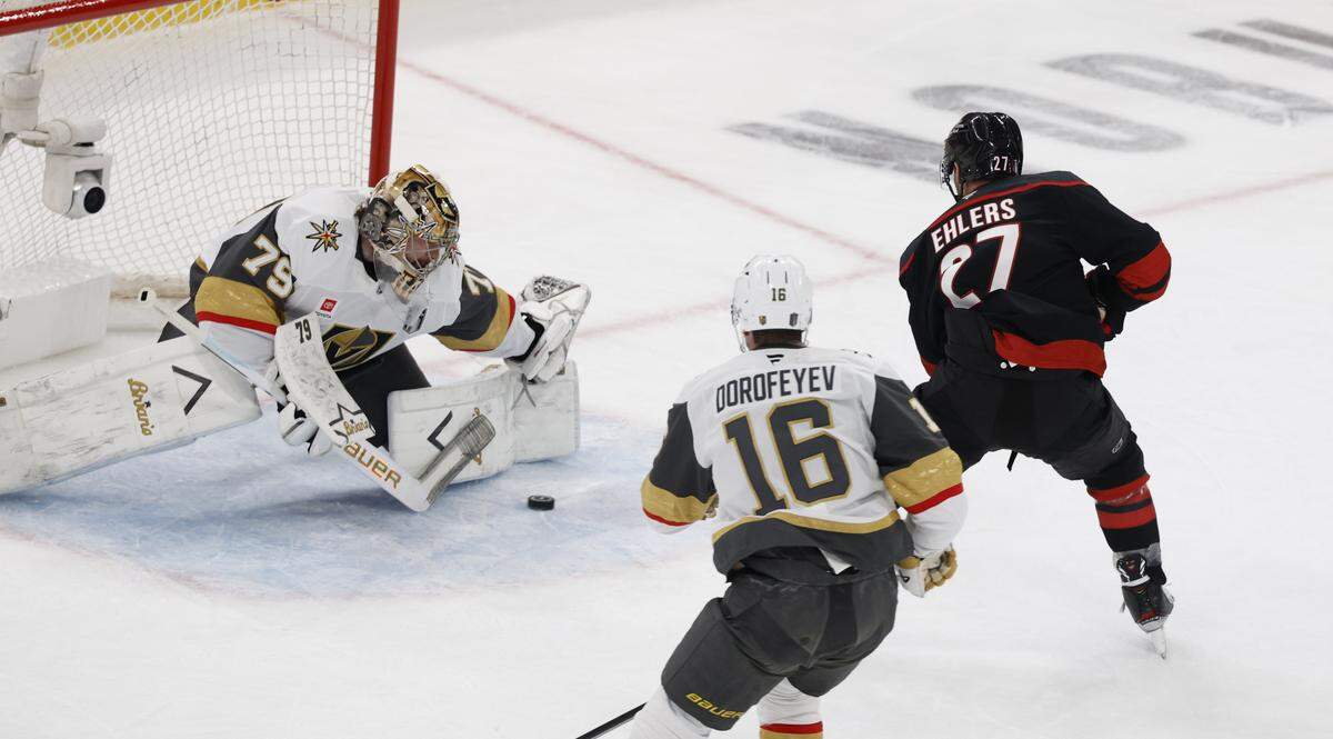 Carolina's Nikolaj Ehlers (27) scores on Vegas’ Carter Hart (79) in the first period of the Hurricanes’ game against the Golden Knights in the first game of the Stanley Cup Final at the Lenovo Center in Raleigh, N.C., Tuesday, June 2, 2026.