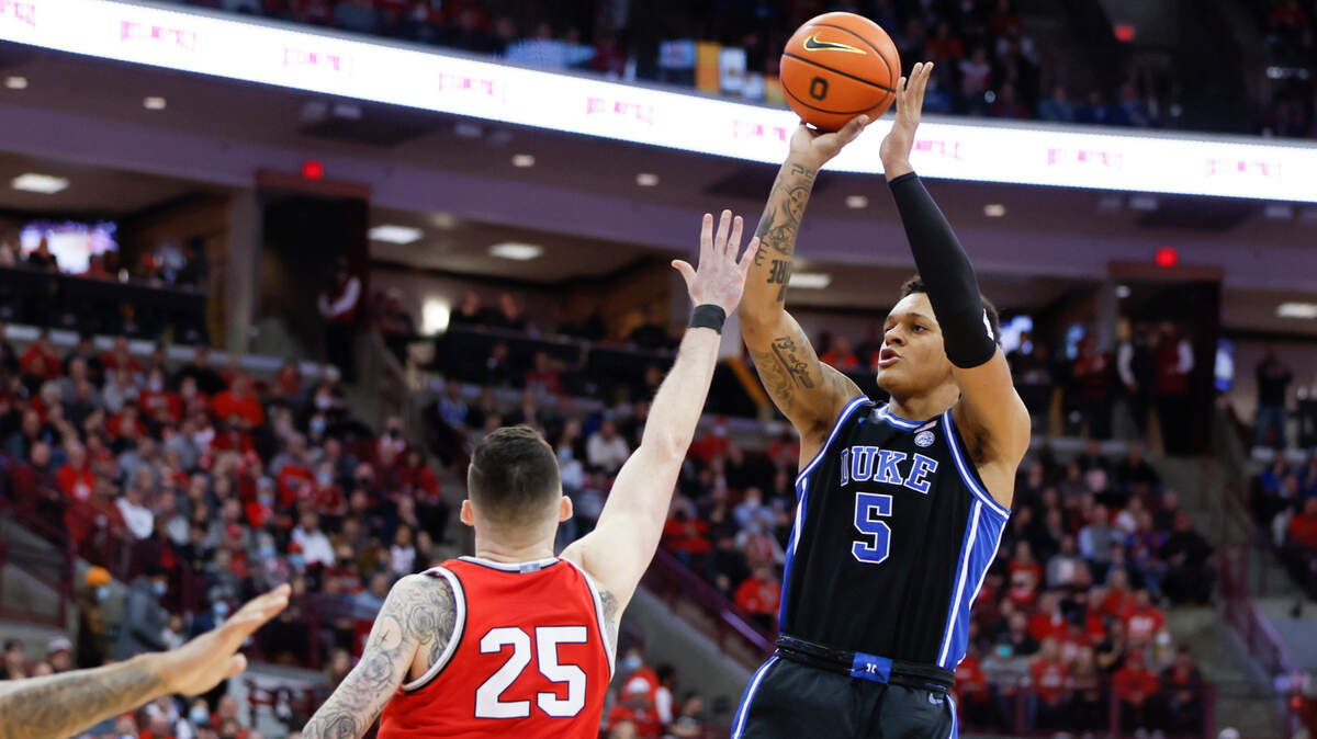 Duke’s Paolo Banchero, right, shoots over Ohio State’s Kyle Young during the first half of an NCAA college basketball game Tuesday, Nov. 30, 2021, in Columbus, Ohio.