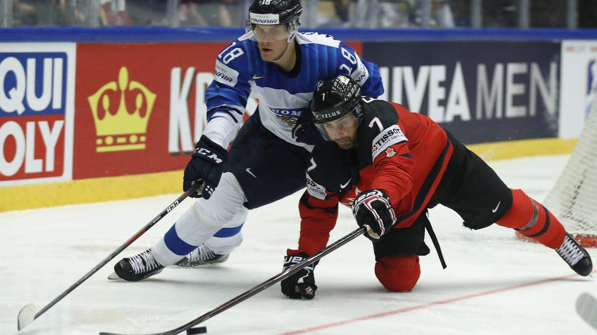 The Carolina Hurricanes added Finnish forward Saku Maenalanen, left, on Friday, signing him to a one-year, two-way contract.