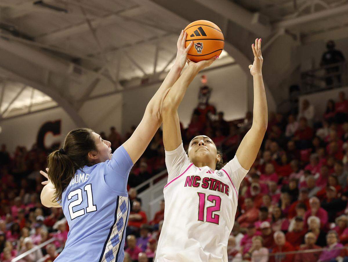 North Carolina’s Ciera Toomey blocks a shot by N.C. State’s Khamil Pierre during the second half of the Tar Heels’ 61-59 win on Monday, Feb. 2, 2026, at Reynolds Coliseum in Raleigh, N.C.