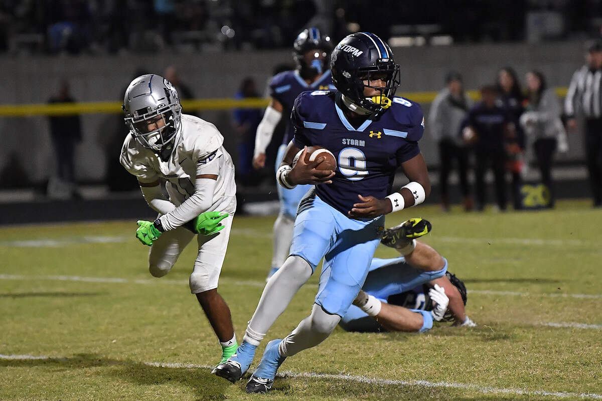 Willow Spring Quahmere Ritter (9) rushes after making the interception in the end zone against Jaiden Swain (11) during the first half. The Willow Spring Storm and the South Garner Titans met in a football game in Fuquay-Varina. N.C. on October 18, 2024.