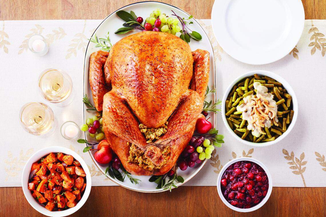 Grocery stores in the Triangle are selling premade meal packages for Thanksgiving, bundling turkey and ham, veggies, rolls and desserts.