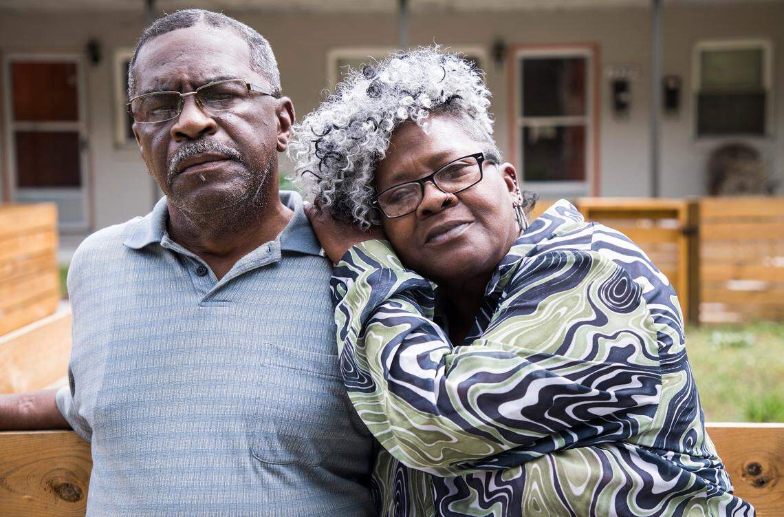 John Abram, left, and Rosemary Abram, right, pose for a portrait outside of their apartment building near the Lakewood neighborhood in Durham, NC on May 18, 2018. The Abrams, who are both on disability, have lived in this apartment for 8 years. Until recently, they also lived with John's late mother, Peggy. Their combined household income is $1,100. Last year, their rent went up from $450 to $500, an increase they could handle. But on April 1, 2018, they were told by 3 Points Properties that they could apply for a new lease at price they could not afford, or vacate the property by April 30th.