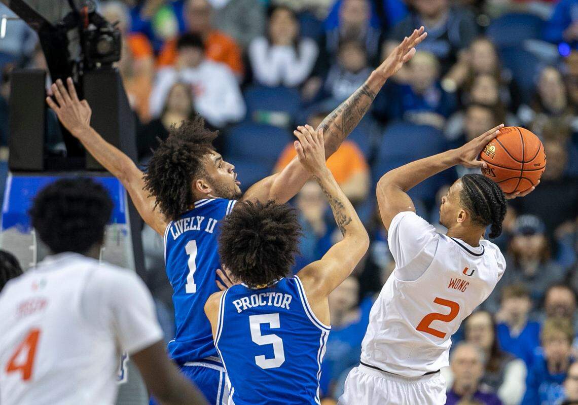 Duke’s Dereck Lively II (1) defends Miami’s Isaiah Wong (2) in the first half during in the semi-finals of the ACC Tournament on Friday, March 10, 2023 at the Greensboro Coliseum in Greensboro, N.C.