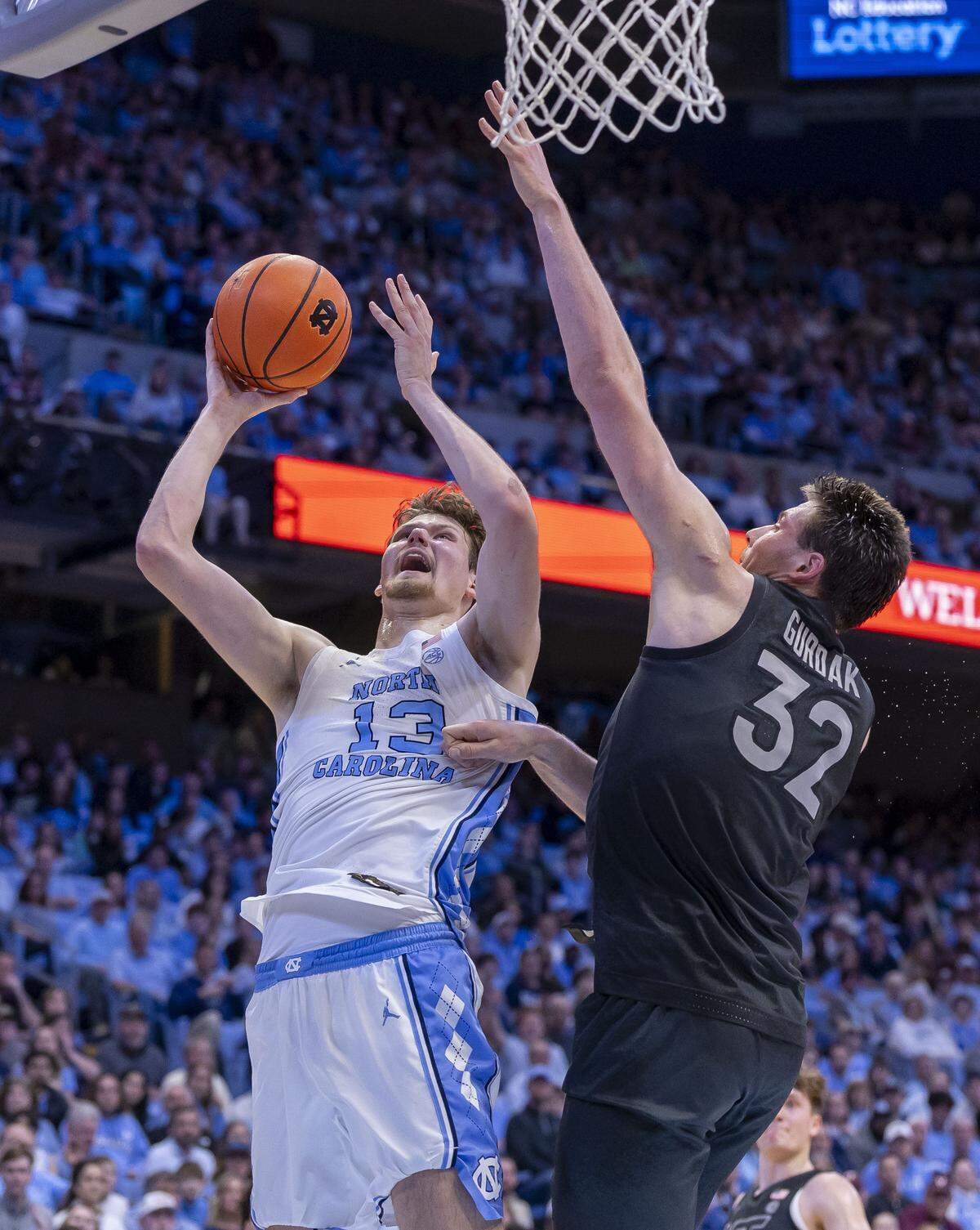North Carolina center Henri Veesaar (13) puts up a shot against Virginia Tech center Christian Gurdak (32) in the first half on Saturday, February 28, 2026 at the Smith Center in Chapel Hill, N.C.