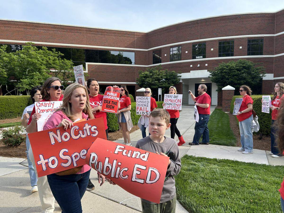 More than 200 picketers urged the Wake County school board to ask commissioners for more than a $25 million increase in school funding during a protest organized by Wake NCAE outside the meeting in Cary, N.C., on April 7, 2026.