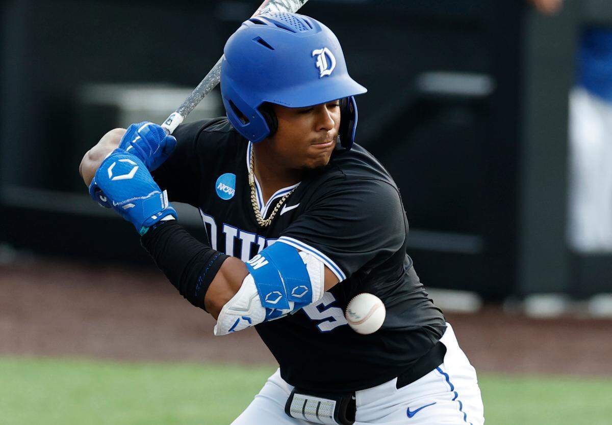 Duke’s Kyle Johnson (5) is hit by a pitch during Duke’s game against Murray State in the third game of the Durham Super Regional at Jack Coombs Field in Durham, N.C., Monday, June 9, 2025.
