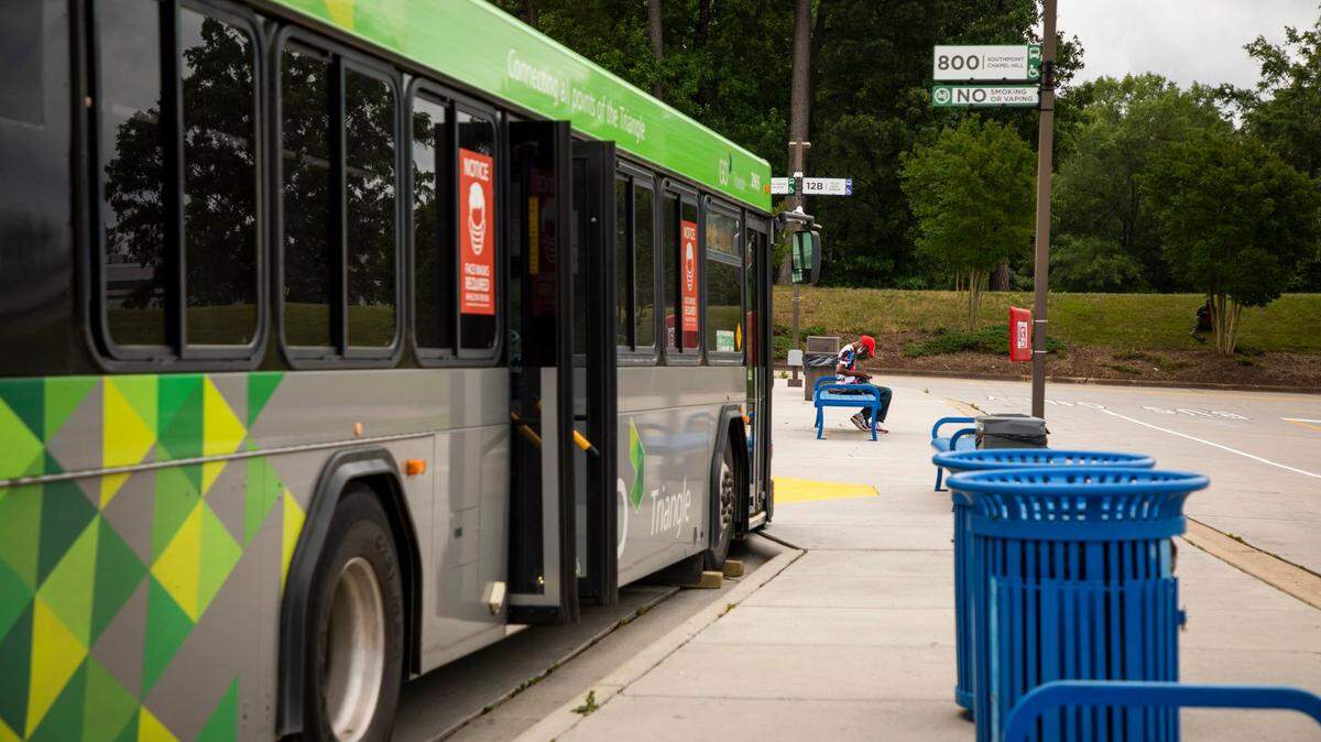 A bus idles at the GoTriangle Regional Transit Center in Durham, on June 7, 2021.