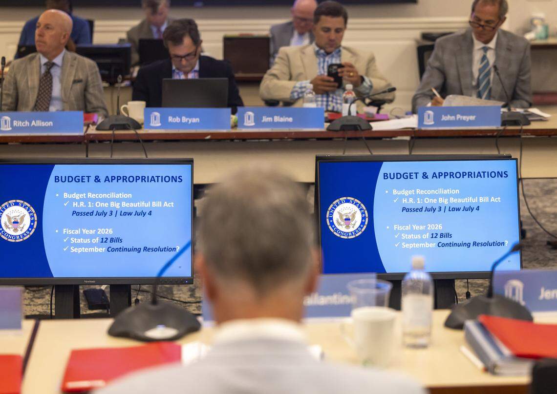 UNC Board of Trustees members listens to Kelly Dockham, director of federal affairs for the University of North Carolina, as she makes a presentation about budget and appropriations on Tuesday, July 30, 2025 in Chapel Hill, N.C.