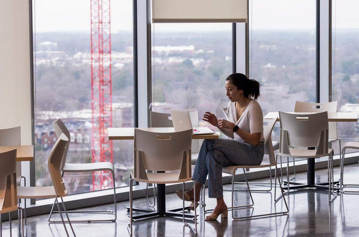A Pendo employees works in the software company’s new downtown Raleigh headquarters Wednesday, Feb. 23, 2022.