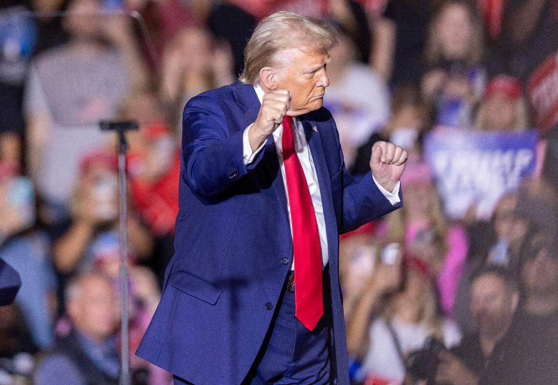 Former President Donald Trump dances while leaving the stage following a rally speech at Minges Coliseum in Greenville on Monday, Oct. 21, 2024. With two weeks until Election Day, Trump went on a three-city tour, in which Trump will also see the destruction caused by Hurricane Helene in Asheville and speak at a faith conference in Concord.