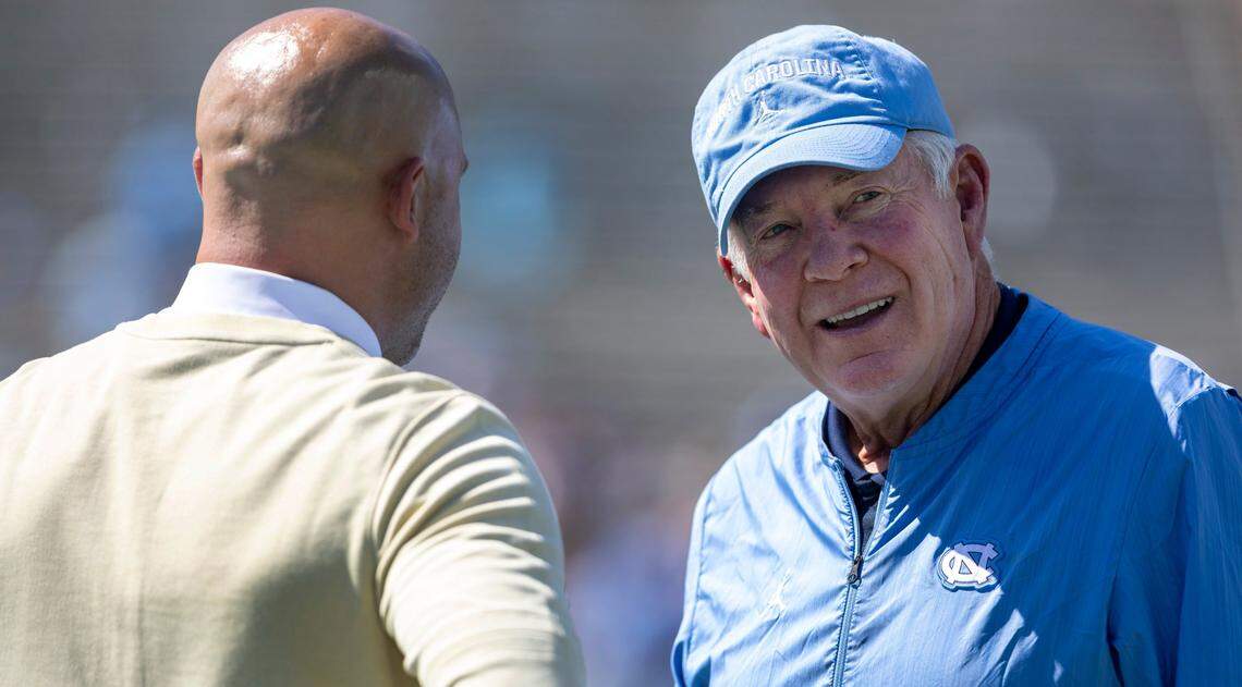 North Carolina coach Mack Brown talks with Minnesota head coach P.J. Fleck prior to the Tar Heels’ game against Minnesota on Saturday, September 16, 2023 at Kenan Stadium in Chapel Hill N.C.