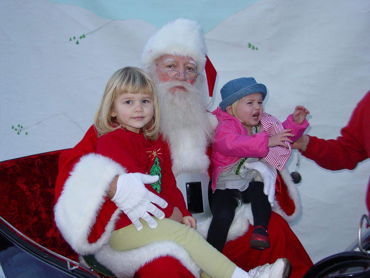 Mary Ann Wilson’s daughters with Santa.