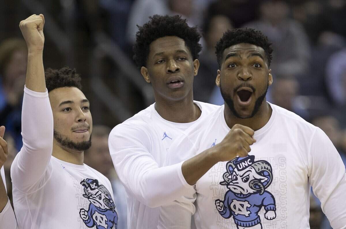 North Carolina’s Shea Rush (11), Sterling Manley (21) and Brandon Huffman (42) react to a basket by teammate Garrison Brooks (15) during the second half against Iona on Friday, March 22, 2019 at Nationwide Arena in Columbus, Ohio.