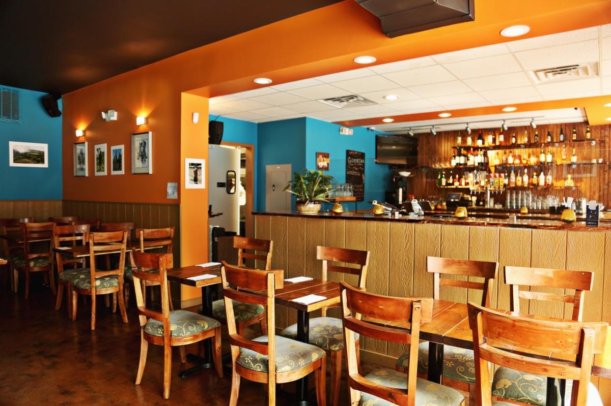Goorsha opened last summer in the old Rainbow Chinese building with a fresh new look - a mix of Ethiopian folk art and scenic photographs on colorful walls, a cozy bar just inside the entrance, and an umbrella-shaded patio.