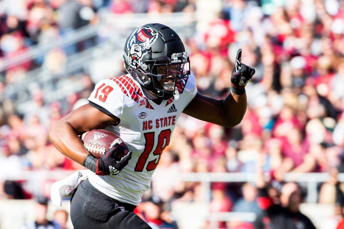 North Carolina State wide receiver C.J. Riley (19) celebrates as he crosses the goal line for a touchdown in the first half of an NCAA college football game against Florida State in Tallahassee, Fla., Saturday, Nov. 6, 2021.