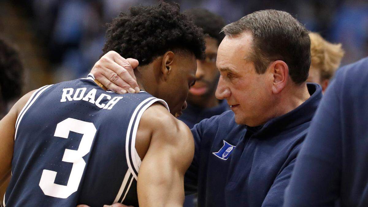 Duke head coach Mike Krzyzewski talks with Jeremy Roach (3) during the second half of Dukeís 87-67 victory over UNC at the Smith Center in Chapel Hill, N.C., Saturday, Feb. 5, 2022.
