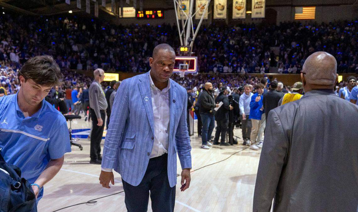 North Carolina coach Hubert Davis waits for his players to leave the court following the Tar Heels’ 87-70 loss to Duke on Saturday, February 1, 2025 at Cameron Indoor Stadium in Durham, N.C.