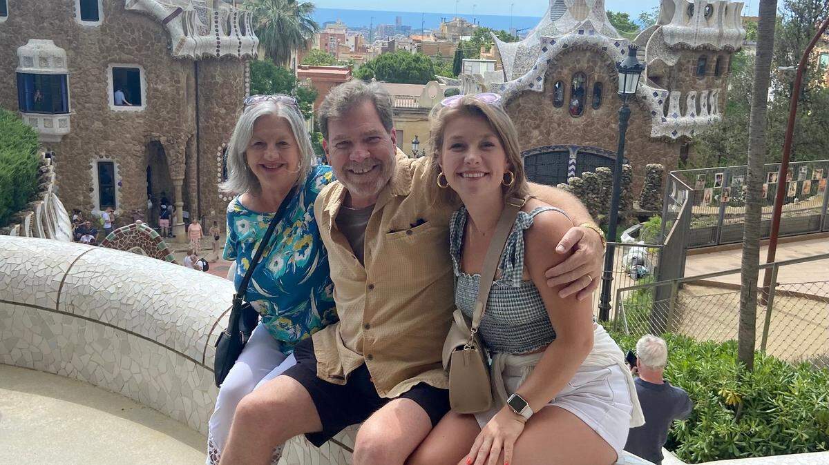 Former ABC11 reporter Ed Crump, center, with wife Donna, left, and daughter Kayla, in Park Güell, Barcelona, Catalonia, Spain, in June 2022.
