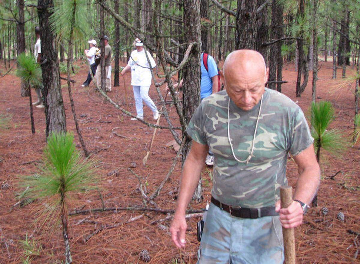 Al Mignacci leading a search through the Fayetteville NC woods for missing Fort Bragg soldier Kelli Bordeaux in 2012.