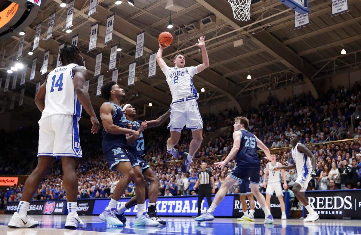 Duke’s Cooper Flagg (2) heads to slam in two during Duke’s 96-62 victory over Maine at Cameron Indoor Stadium in Durham, N.C., Monday, Nov. 4, 2024.