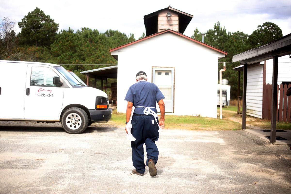 Steve Grady takes a break outside after the lunch rush Friday, Oct. 30, 2020, at Grady’s Barbecue in Dudley, NC.  Grady and his wife, Gerri, have run Grady’s Barbecue since 1986.
