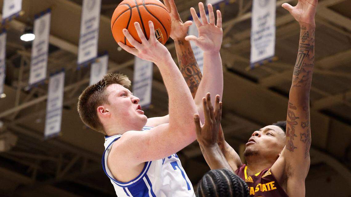 Duke’s Kon Knueppel (7) shoots as Arizona State’s BJ Freeman (10) defends during the first half of Duke’s game against Arizona State in the Brotherhood Run Charity Game at Cameron Indoor Stadium in Durham, N.C., Sunday, Oct. 27, 2024.