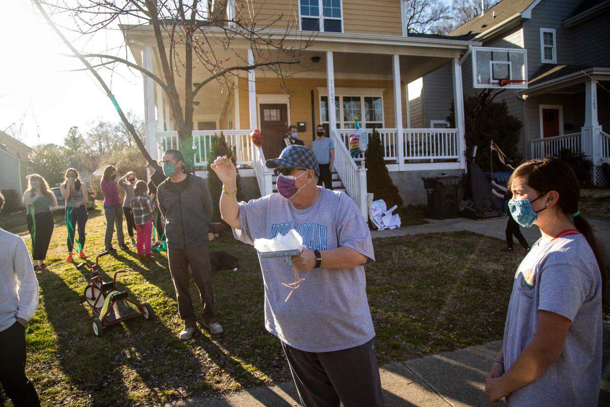 After serving nearly 30 years in prison Sandy Dowell, center, is greeted with a welcoming party in Durham after her prison release Monday, March 8, 2021. A lawsuit related to state prison conditions during COVID-19 has resulted in a settlement releasing 3,500 people in prison over the next six months.