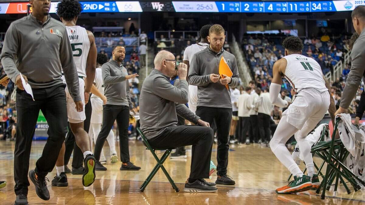 Miami coach Jim Larrañaga takes a sip of water before leaving the huddle following a time out in the second half against Wake Forest in the third round of the ACC Tournament on Thursday, March 9, 2023 at the Greensboro Coliseum in Greensboro, N.C.
